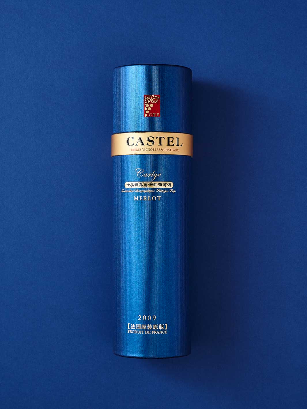 Blauwe kartonnen buisverpakking voor Castel-dranken