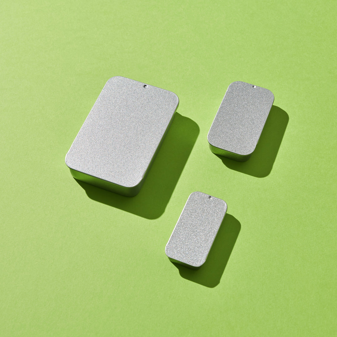 Zilveren rechthoekig blik met schuifdeksel