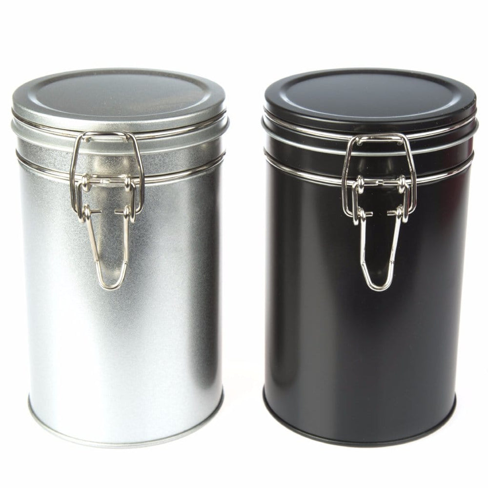 Zwarte en zilveren blikken met clipdeksel