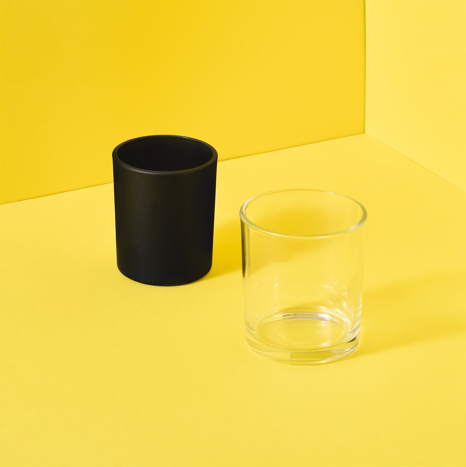 Collectie glazen kaarsenpotten – zwart en transparant

